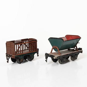 Model train with track and station building, 13 pieces, Germany, 1920s.