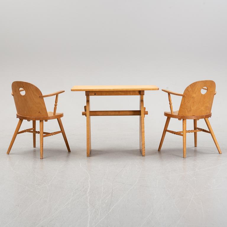 Uno Åhrén, a birch and beech table and pair of armchairs, Gemla, 1930's.