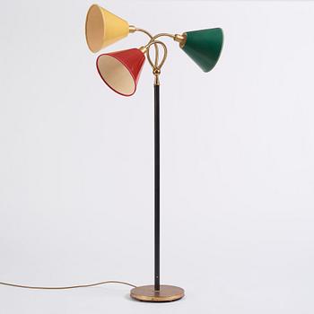 Josef Frank, a brass and black lacquered floor lamp model "2431", Firma Svenskt Tenn, Sweden.