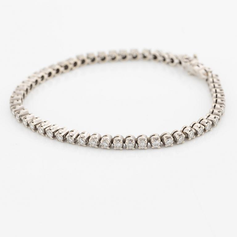 Tennis bracelet, 18K white gold and brilliant-cut diamonds.