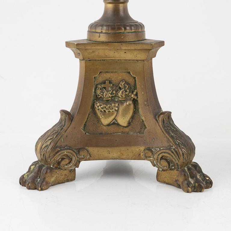 A pair of Baroque style brass altar candleholders, circa 1900.