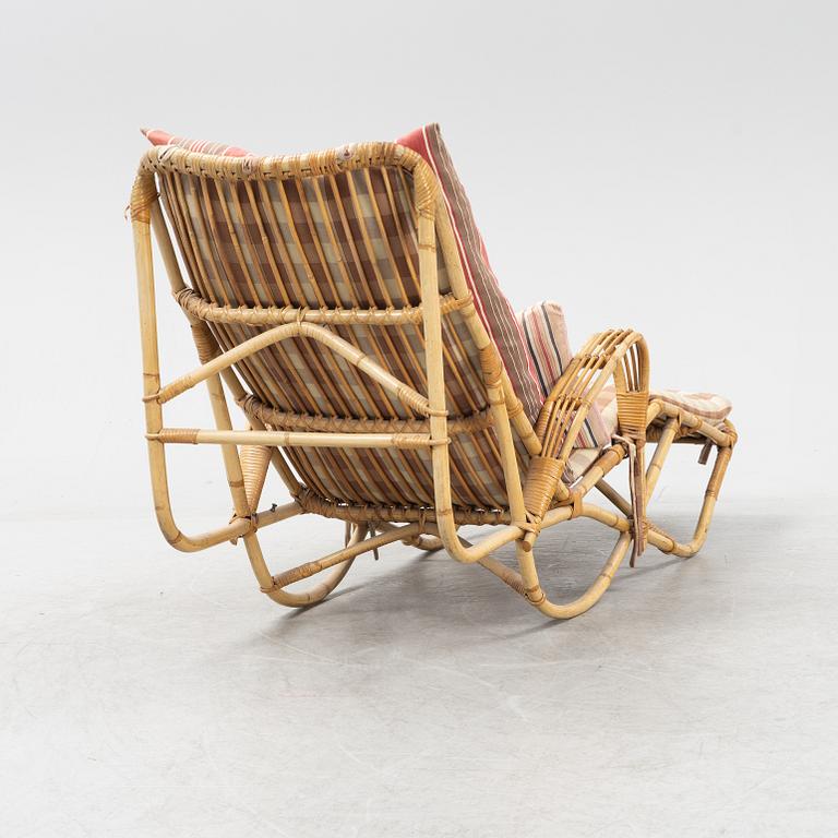 A rattan lounge chair from the secnd half of the 20th century.