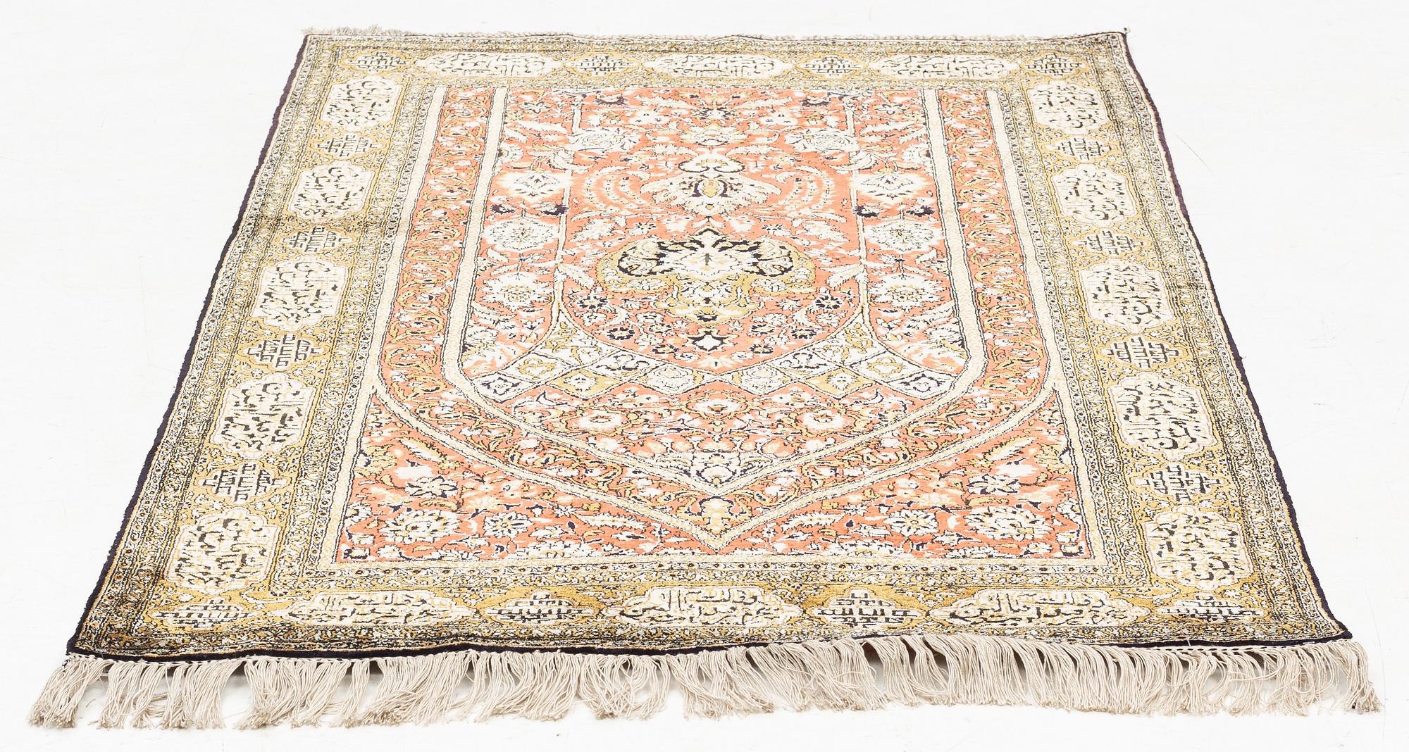 A rug, silk Quum, ca 174 x 103 cm.