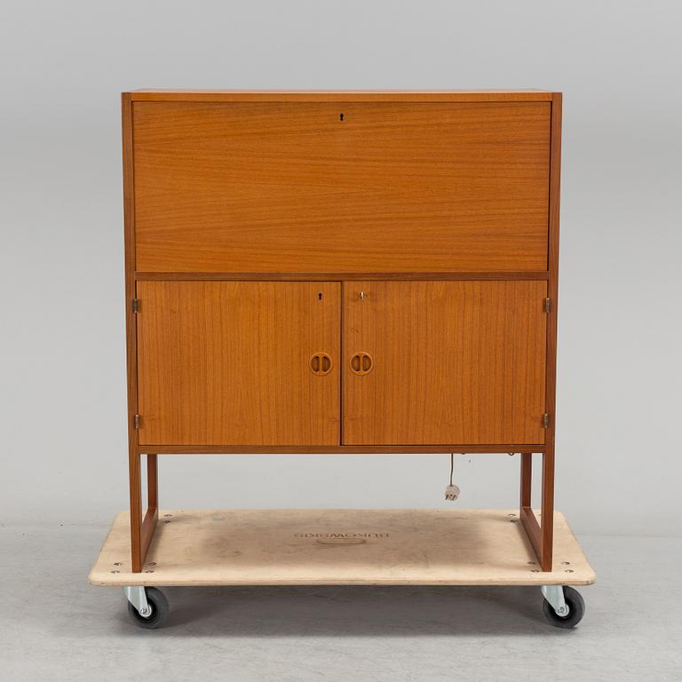 A second half of the 20th century teak veneered bar cabinet by Arne Wahl-Iversen, IKEA.