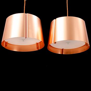 Jonas Lindvall, two 
 "W124" pendant lamps.
