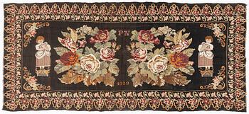 A Kelim carpet, Moldova, dated 1939, circa 385 x 174 cm.