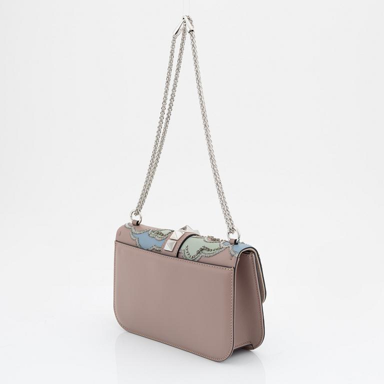 Valentino Garavani, A tinted leather and rhinestone bag.