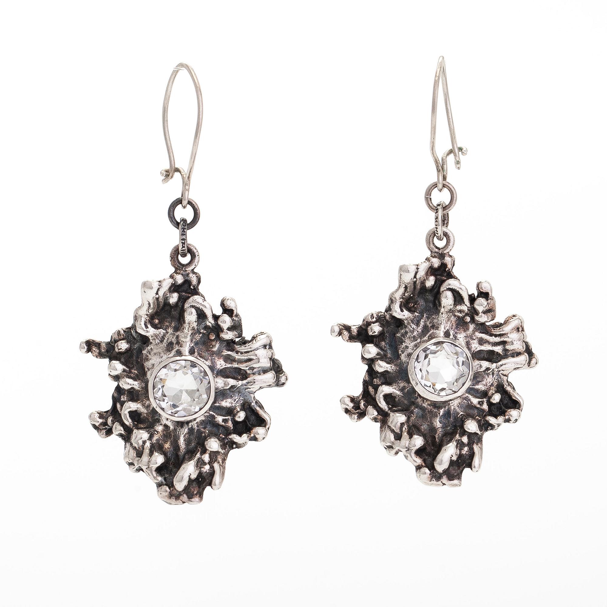 Pentti Sarpaneva, a silver and rock crystal necklace, ring and earrings, Turun Hopea, Turku.
