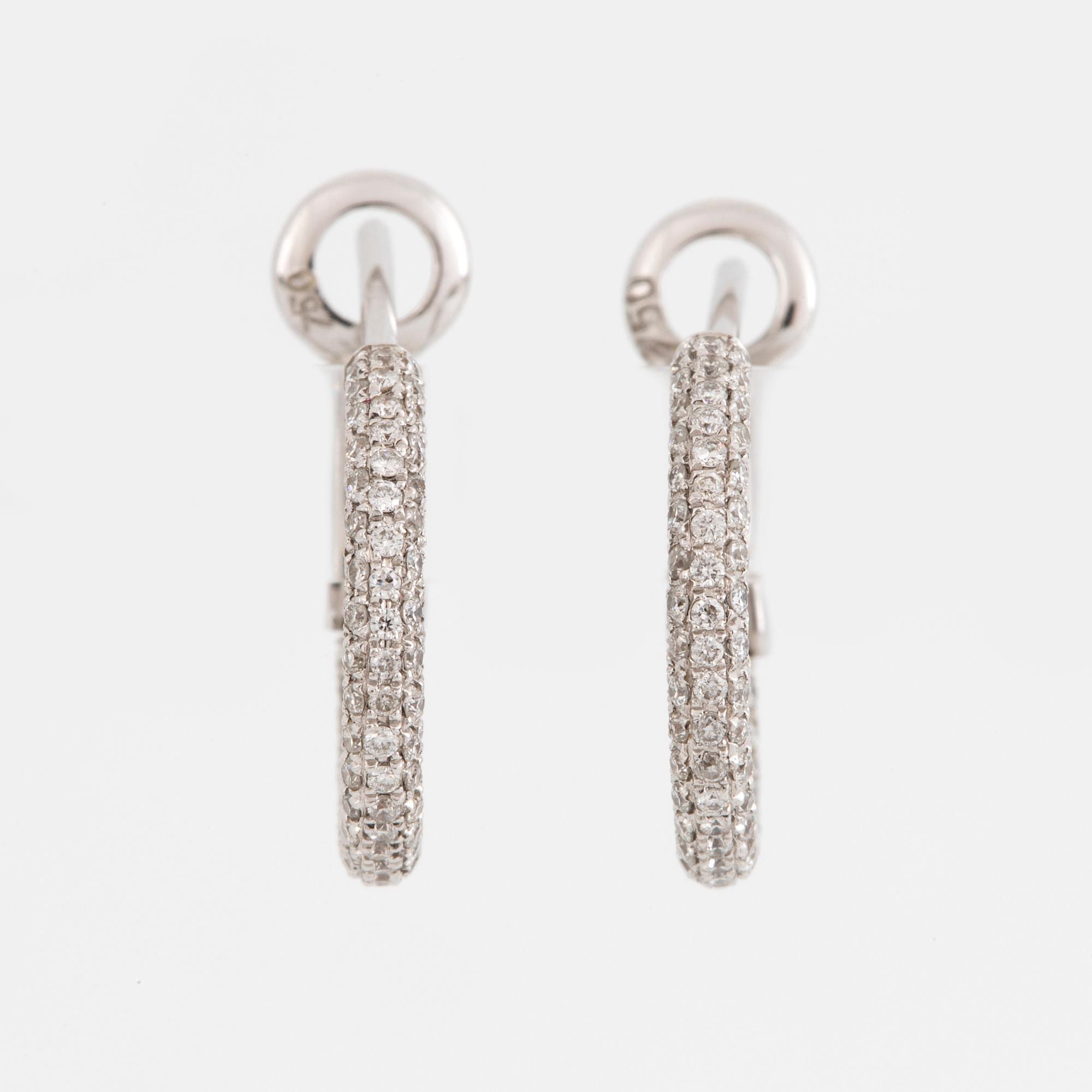 Brilliant-cut diamond pavé earrings.