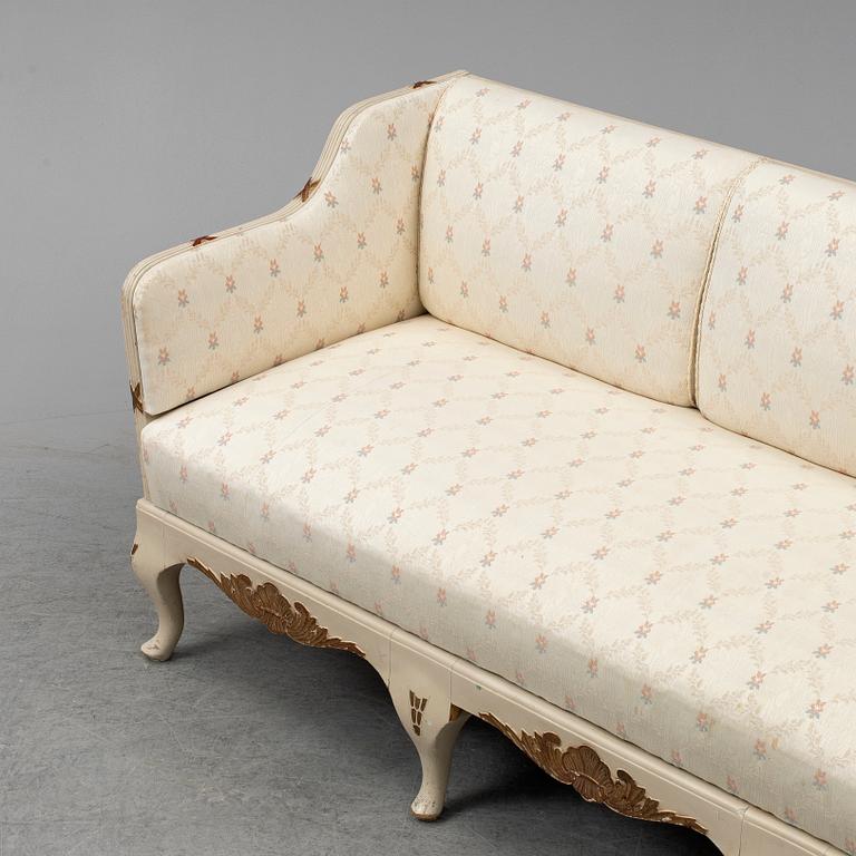 An early 20th century rococo revival sofa.