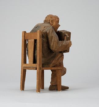 Axel Petersson Döderhultarn, Sittande dragspelare.