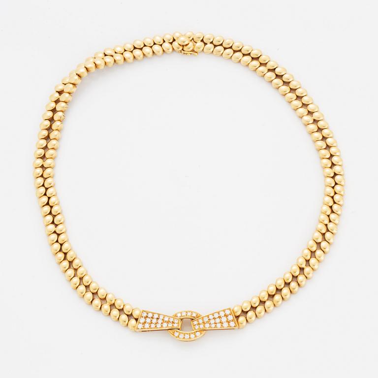 An 18K gold necklace and bracelet.