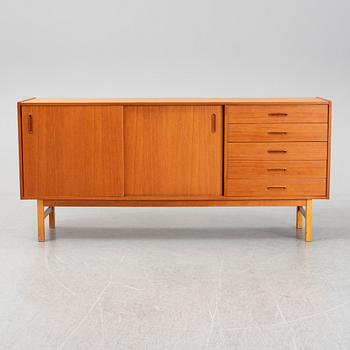 A second half of the 20th century teak veneered sideboard.