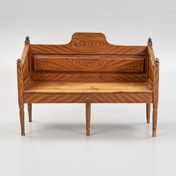 A painted sofa, 19th Century.