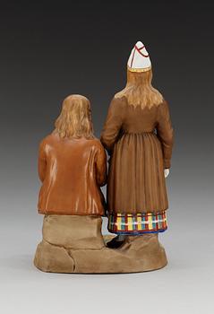 A Gardner Russian bisquit figure group of Estonians, early 20th Century.
