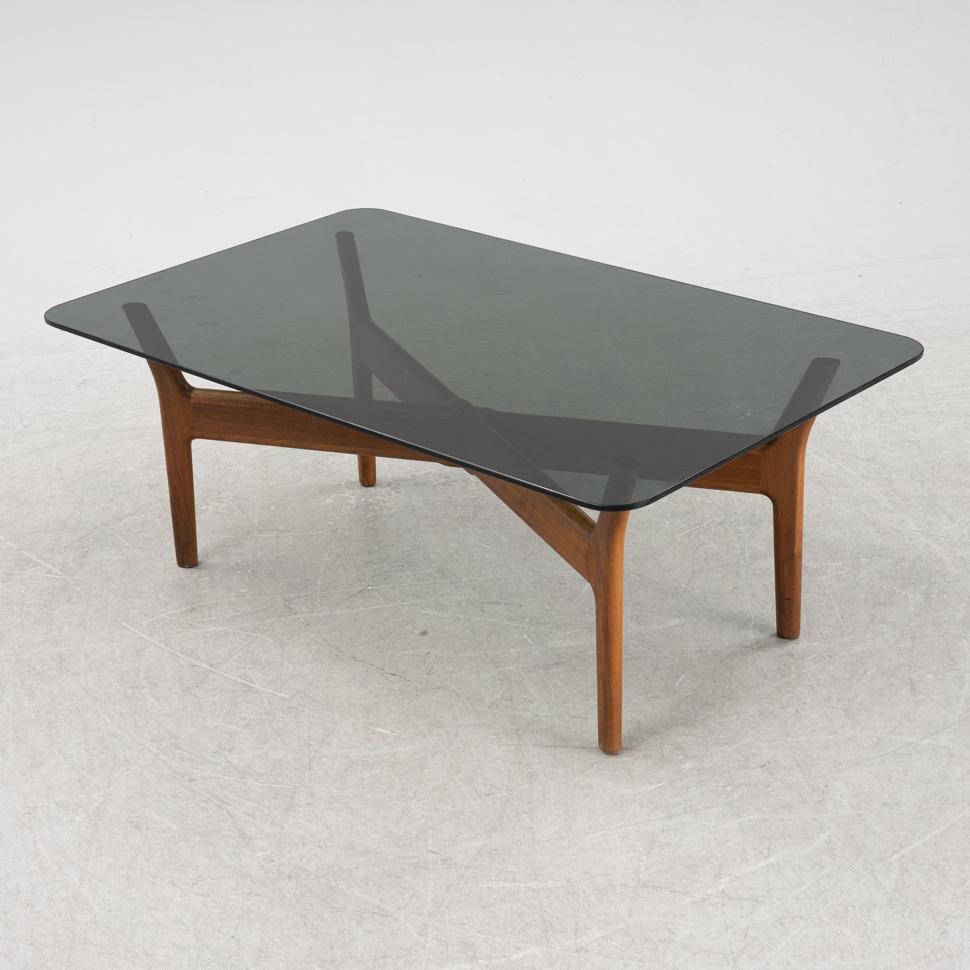 Alf Svensson, a walnut and glass coffee table, Bra Bohag, designed in 1966.