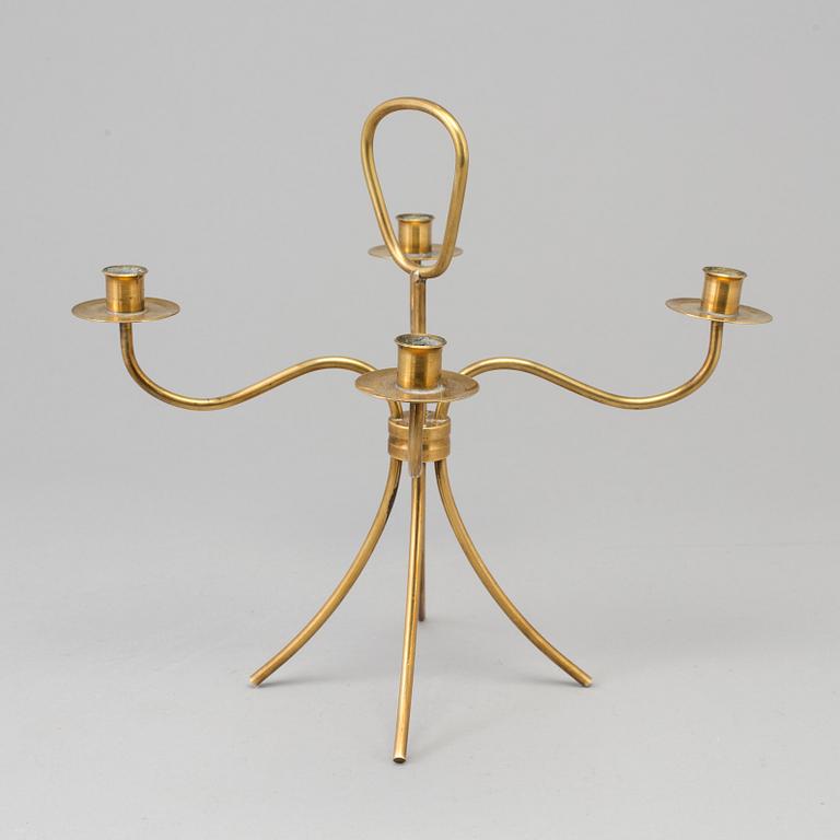 A brass candelabrum, mid 20th Century.