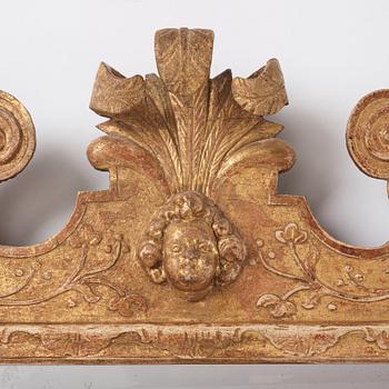 A Northern-European late Baroque two-light giltwood mirror sconce, first part of the 18th century.