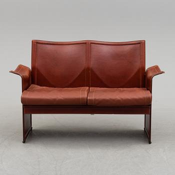 A TITO AGNOLI SOFA BY MATTEO GROSSI.