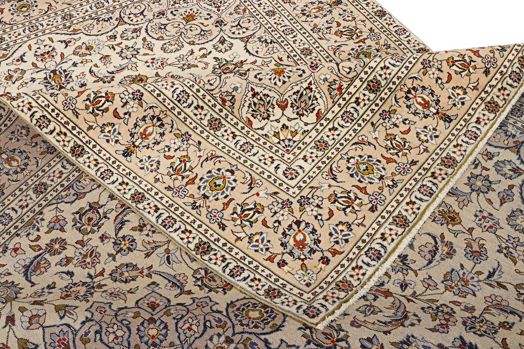 A Kashan carpet, c. 355 x 238 cm.
