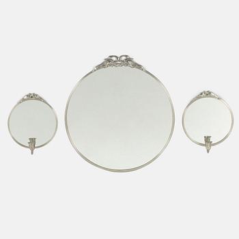 A pewter mirror and a pair of mirror sconces,  second quarter of the 20th century.