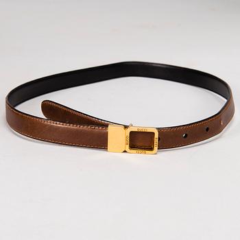 GUCCI Silk Blouse and a Leather Belt.