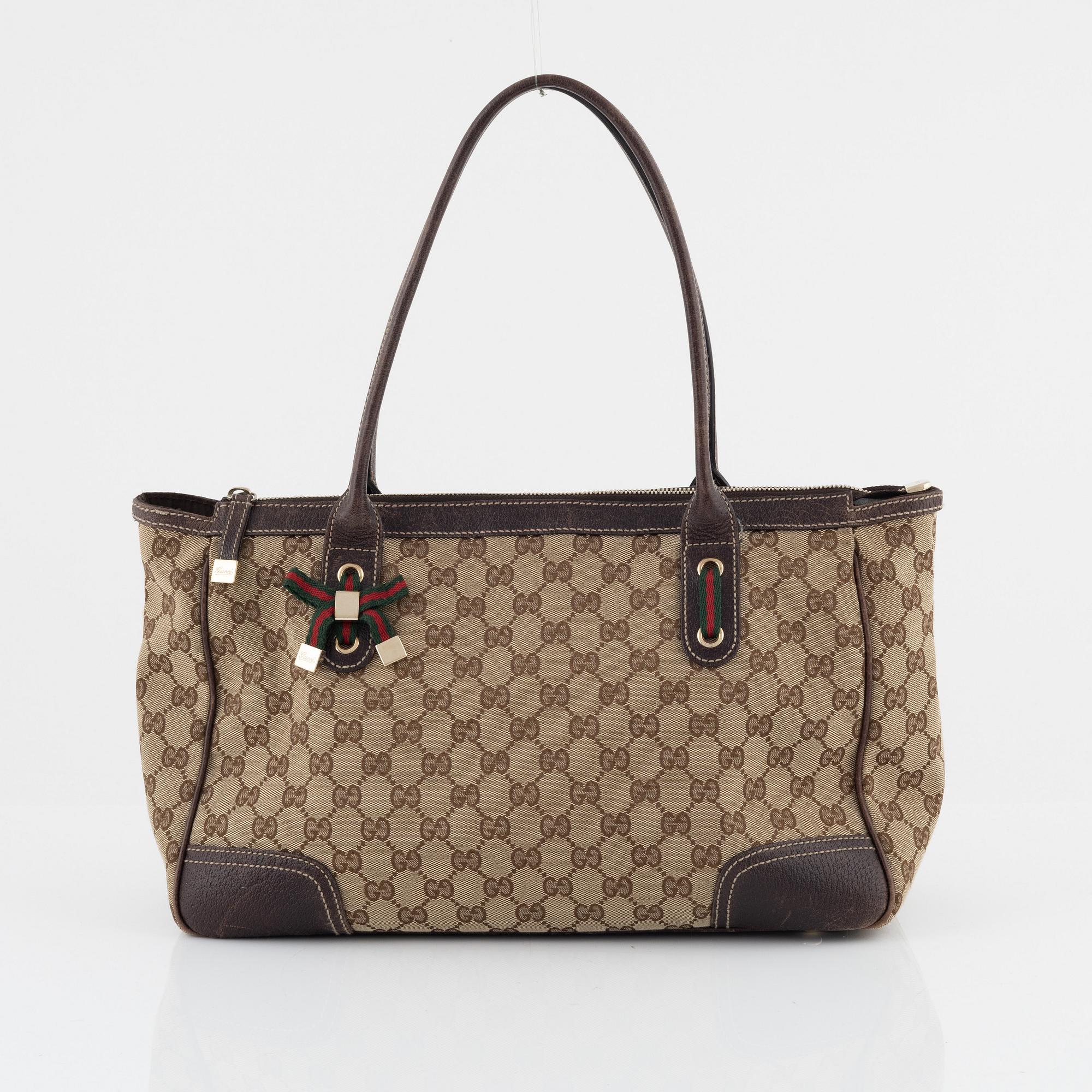 Gucci, a monogram canvas handbag.