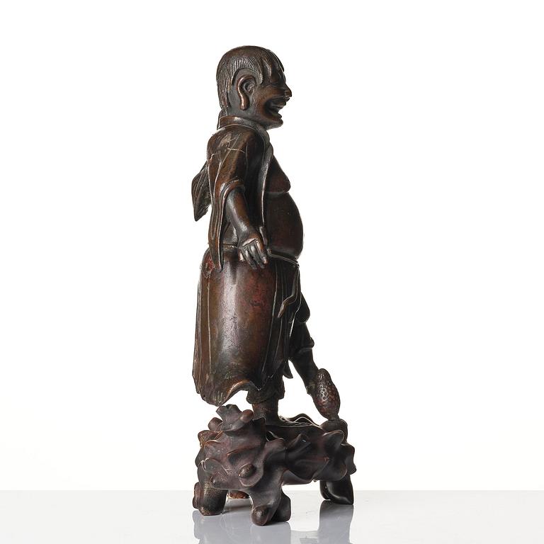 A bronze sculpture of Liu Hai, Qing dynasty, 19th century.