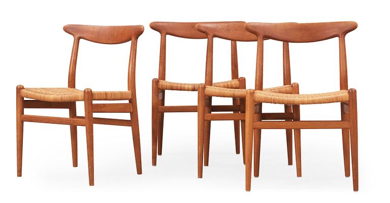 A set of four Hans J Wegner teak and rattan chairs, CM Madsen, Denmark 1950's-60's.