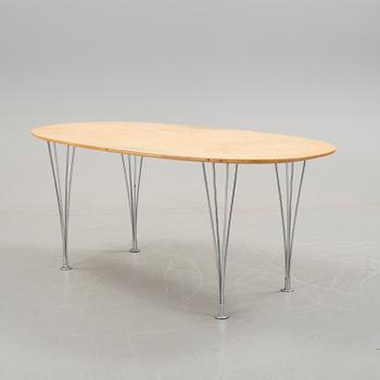 A table "Superellips" by Bruno Mathsson for Fritz Hansen.
