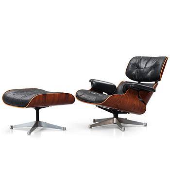 30. Charles & Ray Eames, a 'Lounge chair' and ottoman, Vitra 1960-1970s.