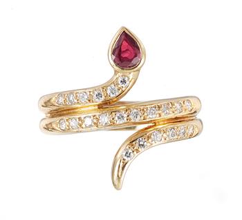 543. RING, set with ruby and diamonds.