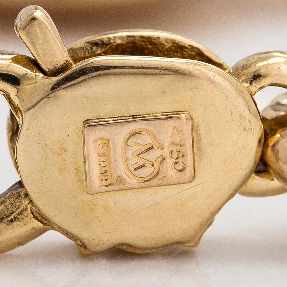 Rannekoru, 18K kultaa, timantteja, safiiri ja karneoli. Italia.