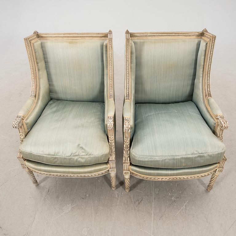 A pair of Louis XVI-style armchairs around year 1900.