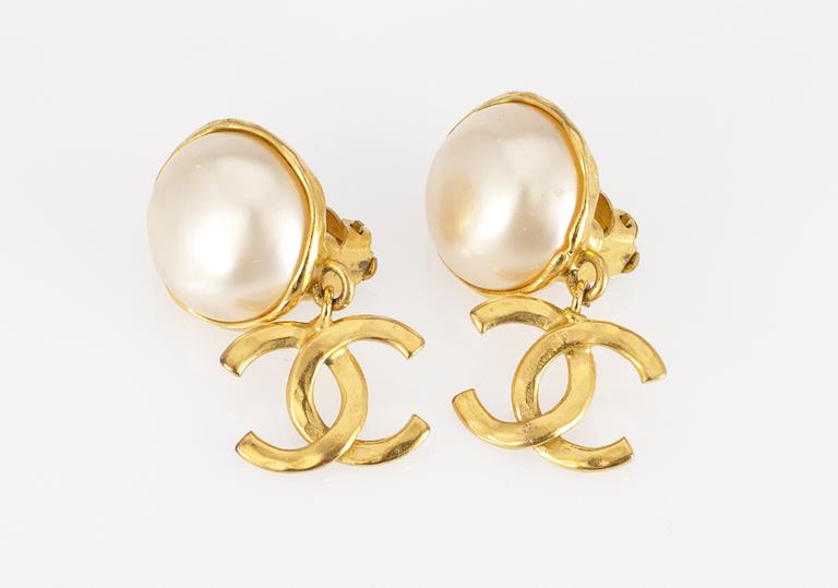 A pair of Chanel earclips.