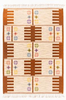 Alice Wallebäck, a flat weave rug, signed AW, c. 235 x 170 cm.