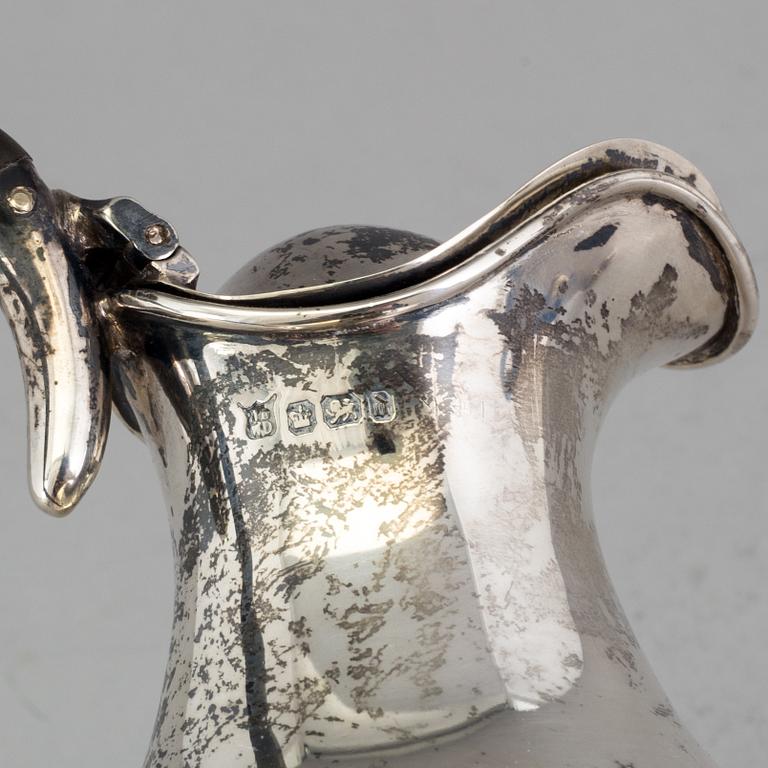 A silver jug by James Deakin & Sons, Sheffield, England, 1896. Weight 410 grams.