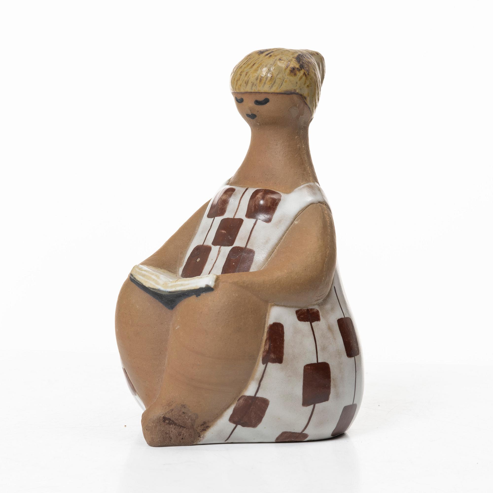 Lisa Larson, a 'Charlotta' stoneware figurine from the series 'ABC-flockorna', Gustavsberg, Sweden.