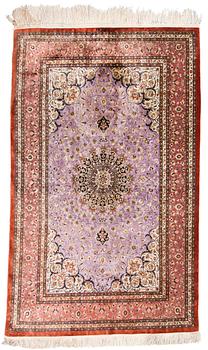 A SILK CARPET, silk Ghom, signed, 164x102 cm.