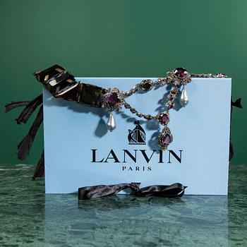 A necklace by LANVIN.
