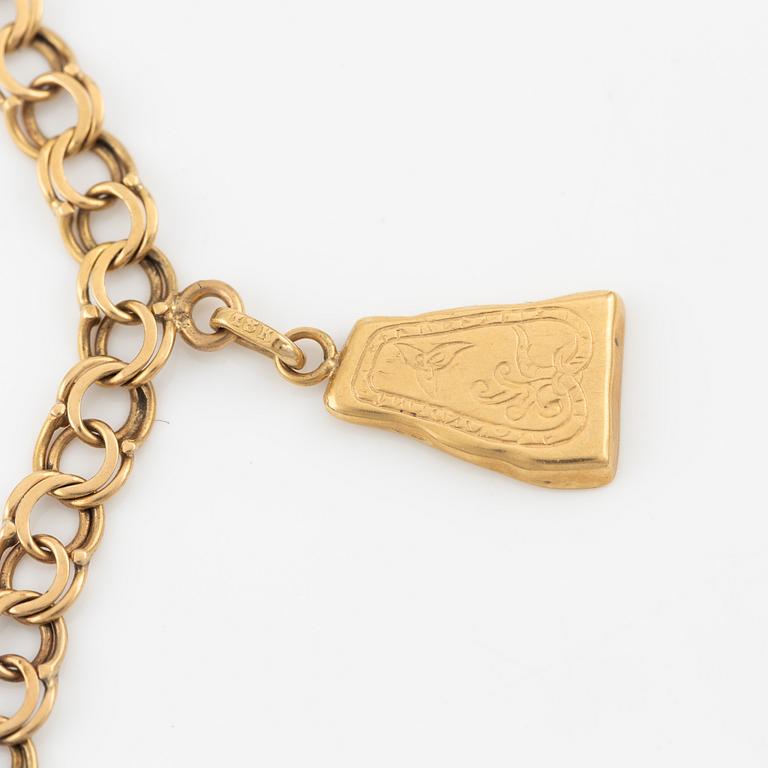 Armband, 18K guld, med berlocker.