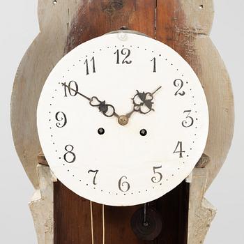 A painted longcase clock, 19th Century.