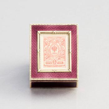 A Fabergé gold, silver-gilt and enamel stamp box, workmaster Henrik Wigström, St Petersburg 1908-17.