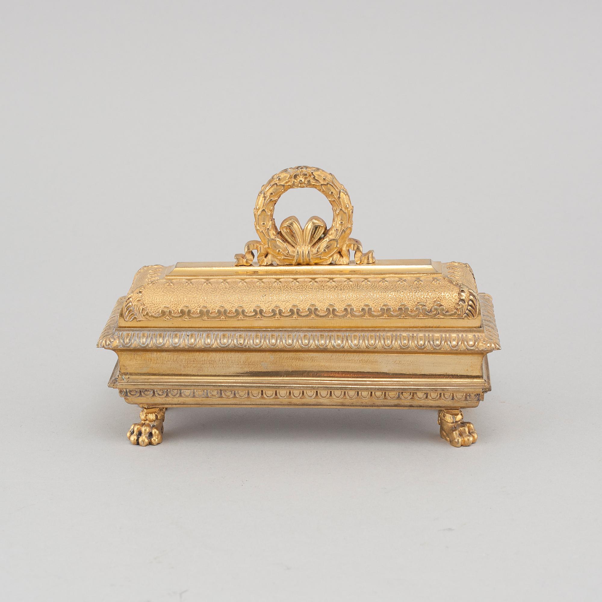 A bronze ink-stand in Empire style, around year 1900.