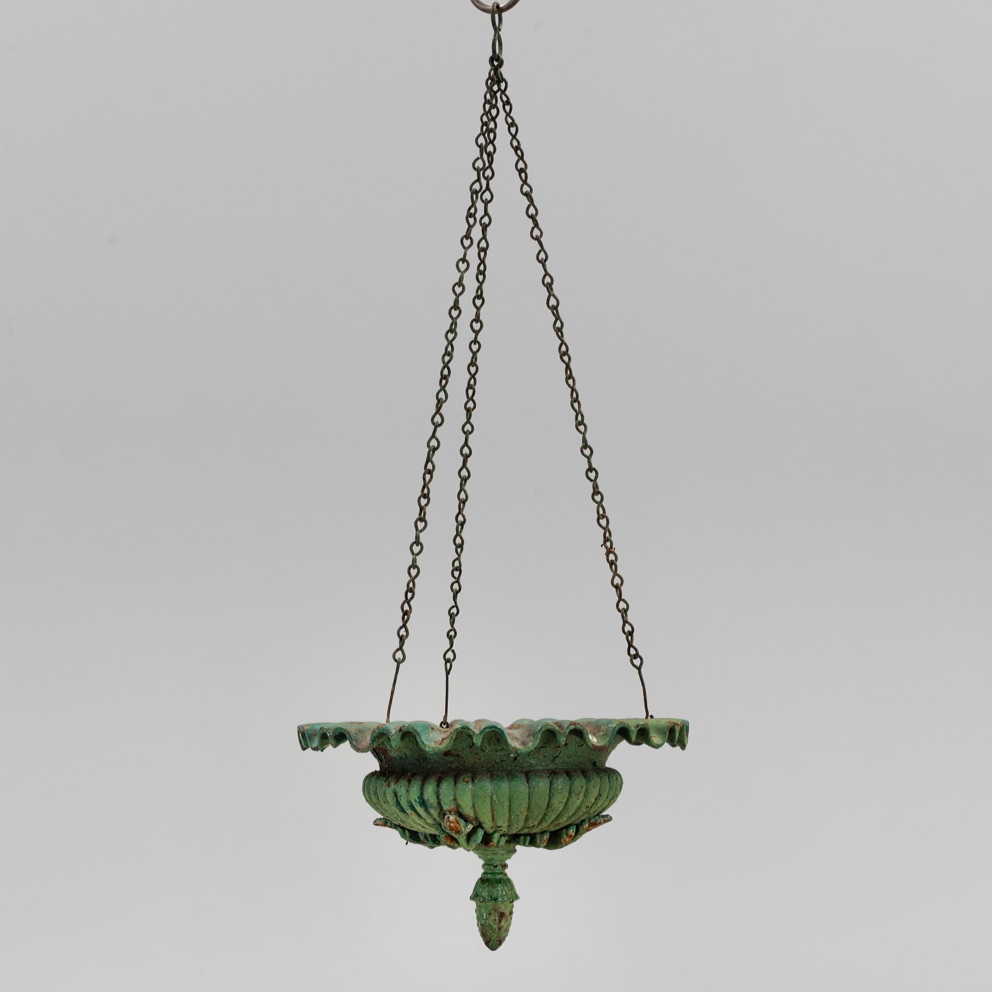 A CAST IRON  HANGING FLOWER POT, first half of the 20th century.