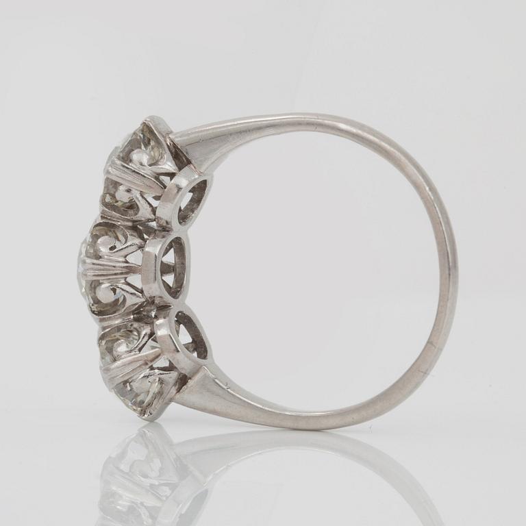 A three stone old-cut diamond ring. Total carat weight circa 3.90 cts. Made by C F Carlman, Stockholm, 1940.