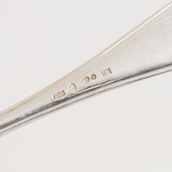 Bestickuppsättning, silver, 59 delar, "Svensk Spets", mestadels KG Markströms Guldsmed AB, 1916-1931.