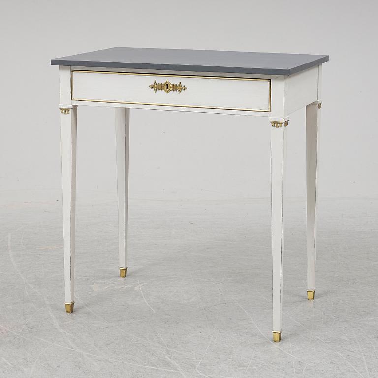A Gustavian style table, first half of the 20th century.