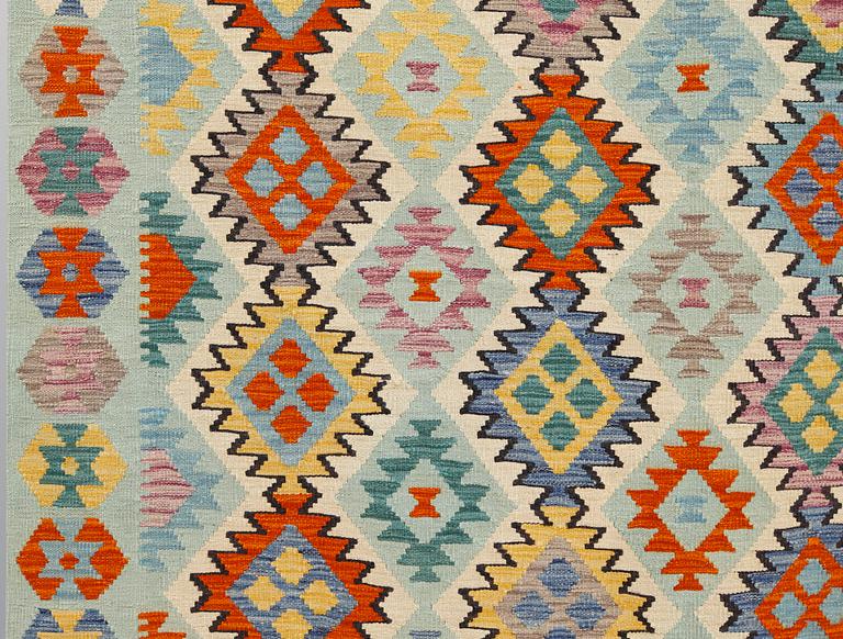 A kilim carpet, ca 294 x 208 cm.