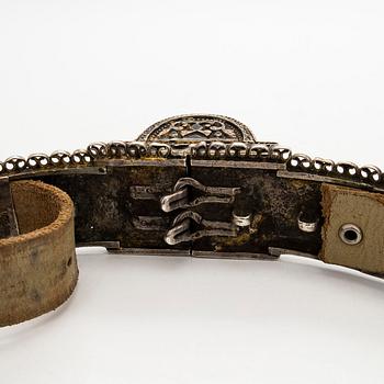 A Caucasian parcel-gilt costume belt with niello decor, 1908-26.